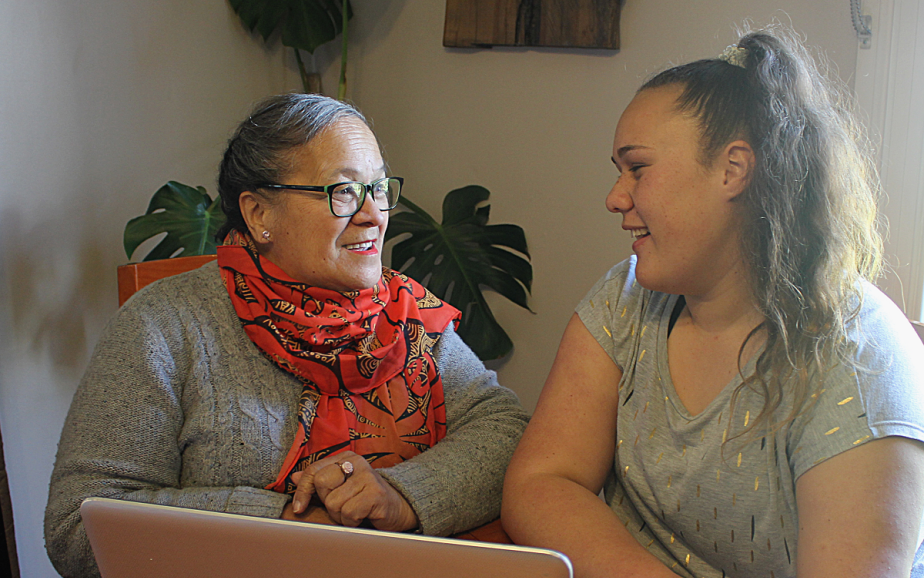 Wahine studying with her moko