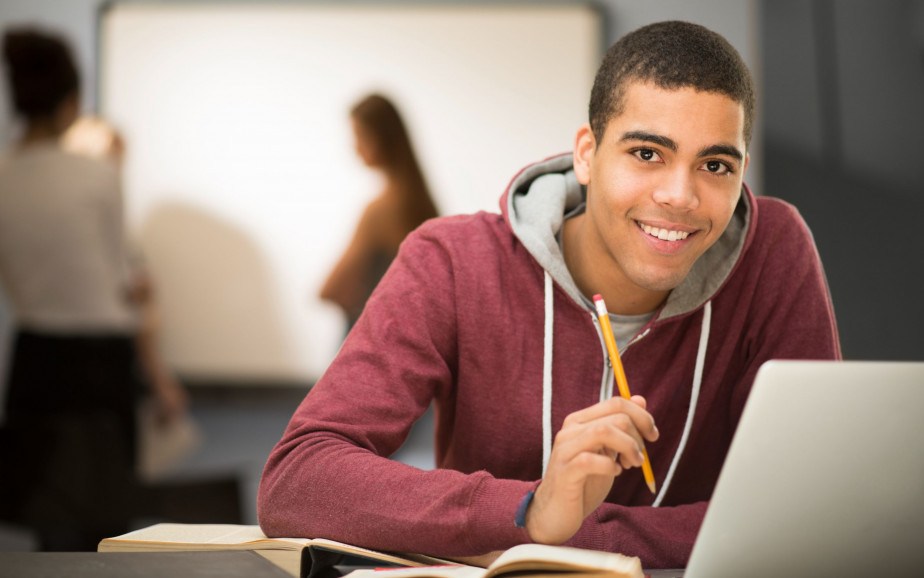 Student in class on a laptop 
