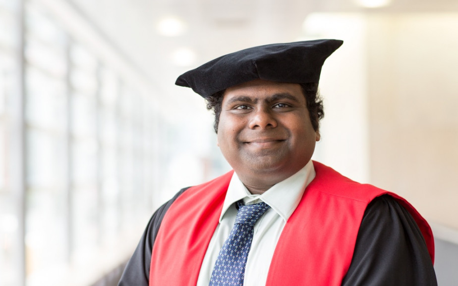 Man in PHD robes