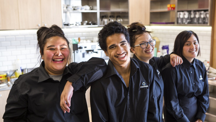 Students smile at camera