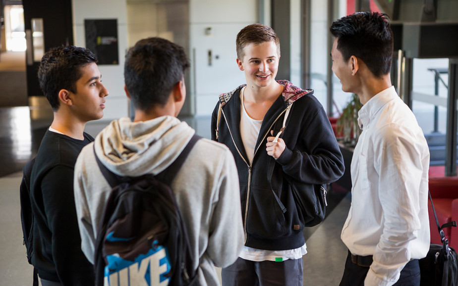 Students standing and talking